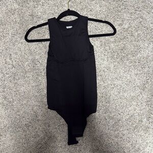 Women’s size small shapewear bodysuit (never been worn)